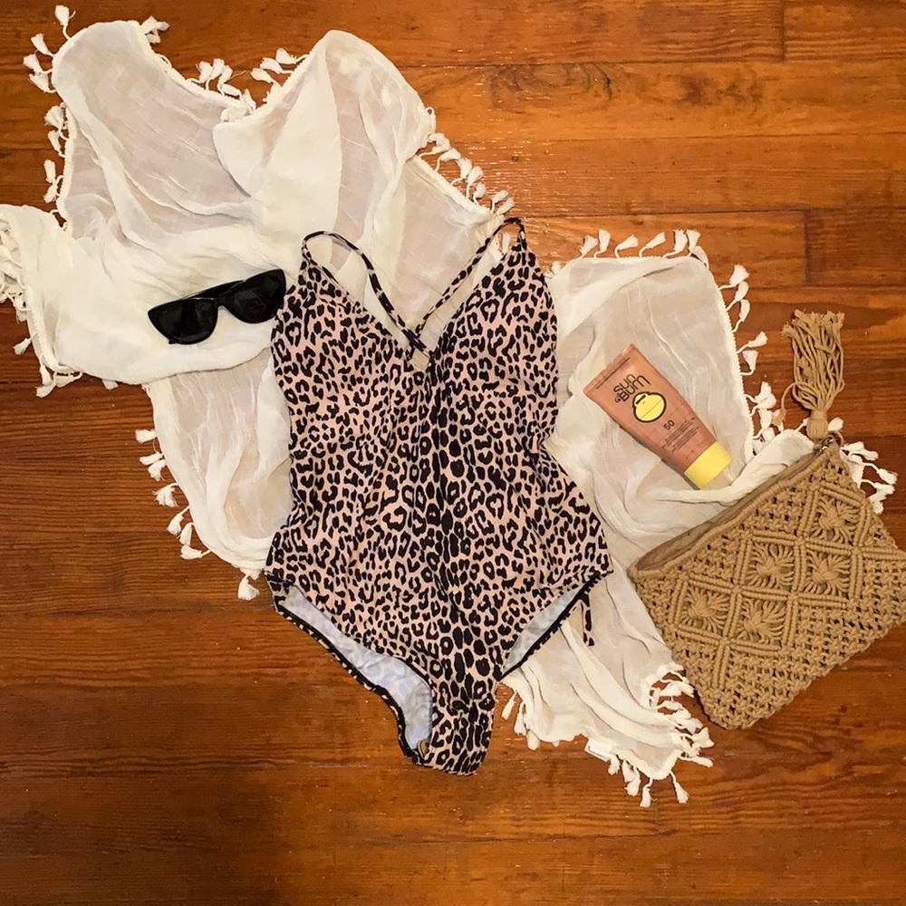 Three one piece swim suits